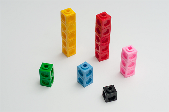 A diagram shows a collection of snap cubes arranged by color. The collection contains 2 green, 5 yellow, 5 red, 3 pink, 2 blue, and 1 black.